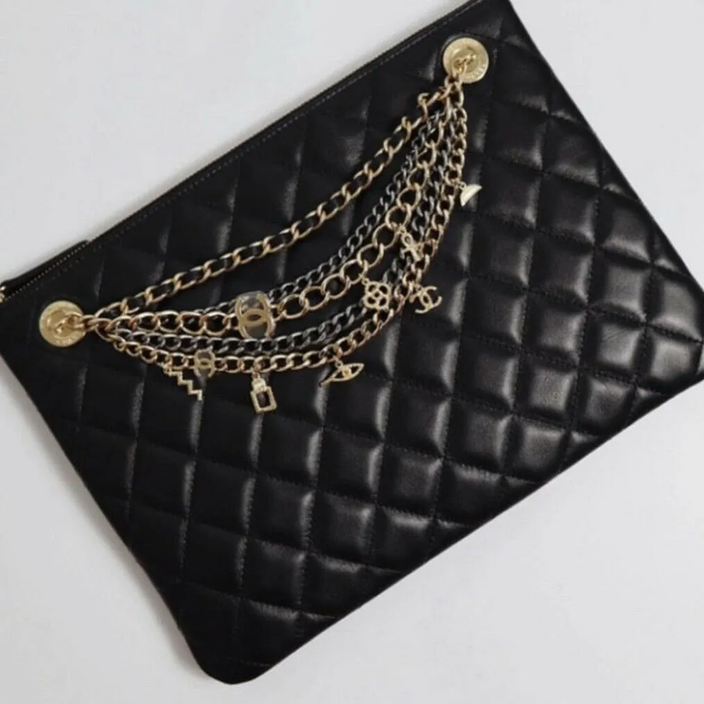 Authentic Chanel Paris-New York Amulet Chains Clutch