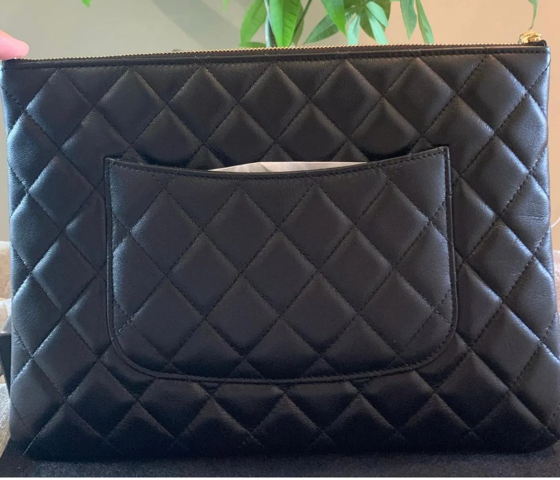Authentic Chanel Paris-New York Amulet Chains Clutch