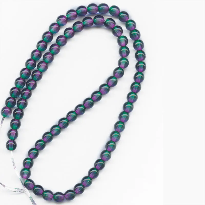 Contemporary Czech emerald and violet glass 6mm rounds, strand of 75. b11-gr-1169(e)
