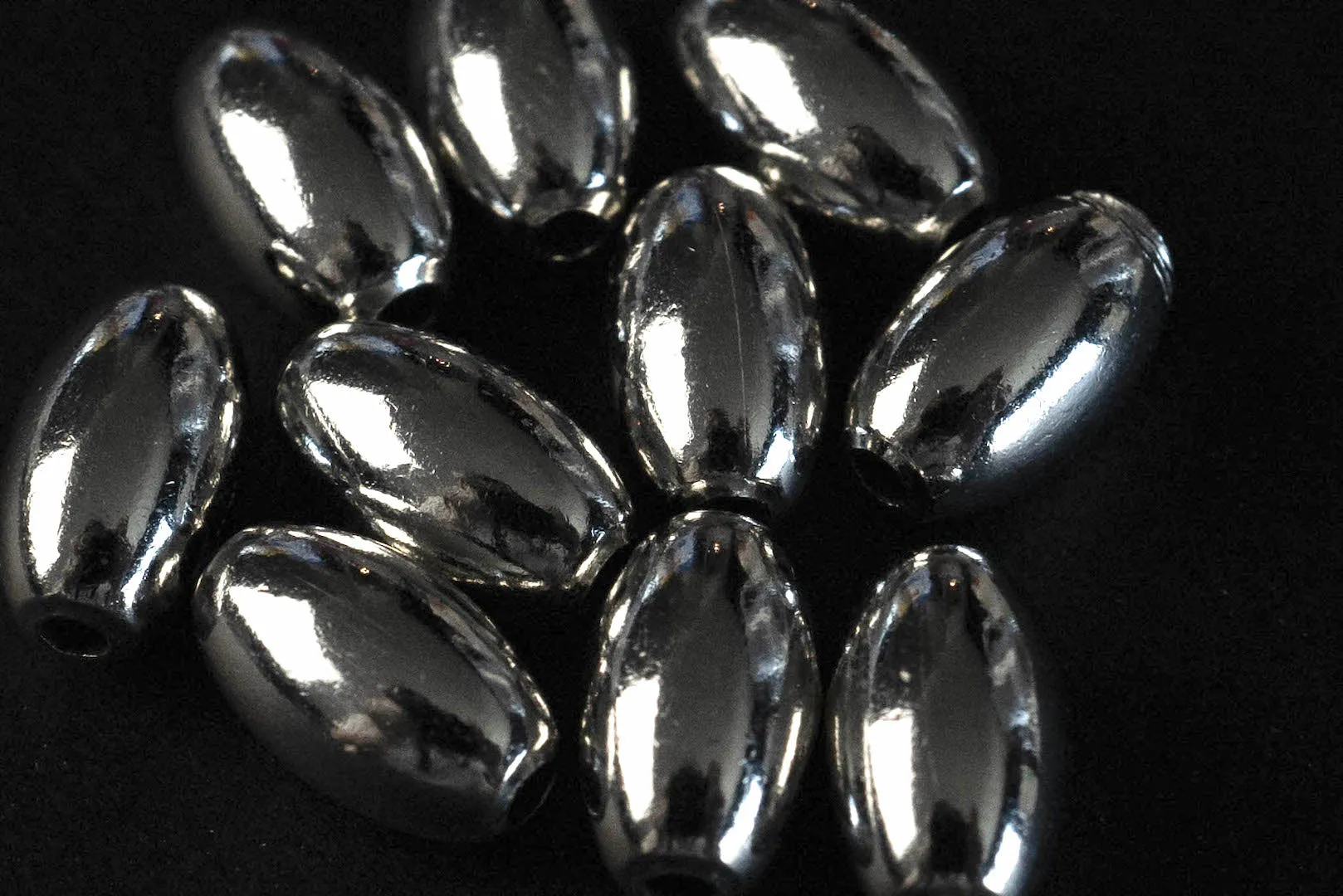 First Arrow's O-104 Silver Beads