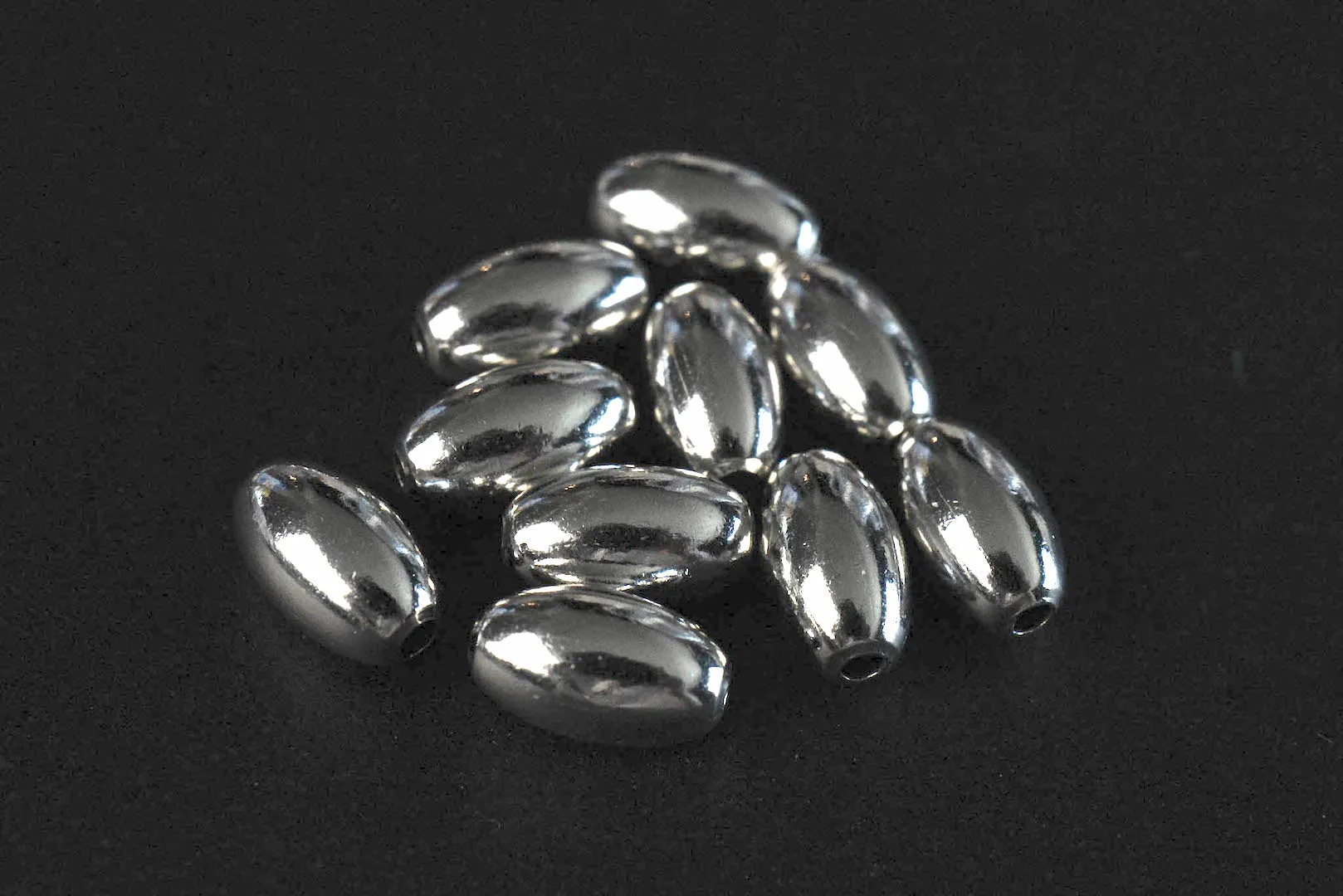 First Arrow's O-104 Silver Beads