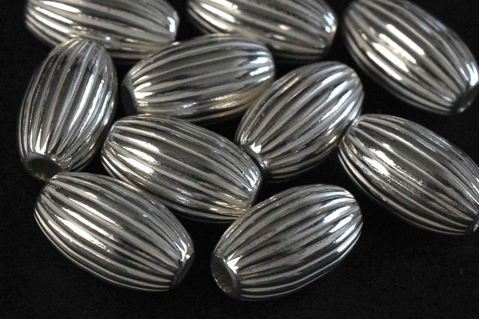 First Arrow's O-106 Silver Beads