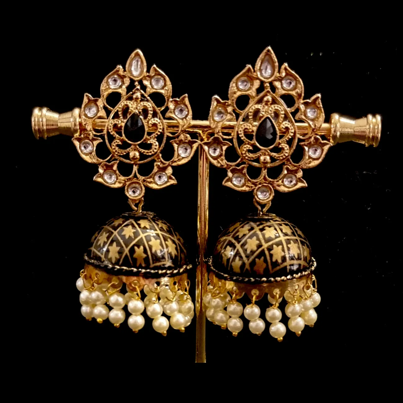Hand crafted meenakari kundan jhumkas.