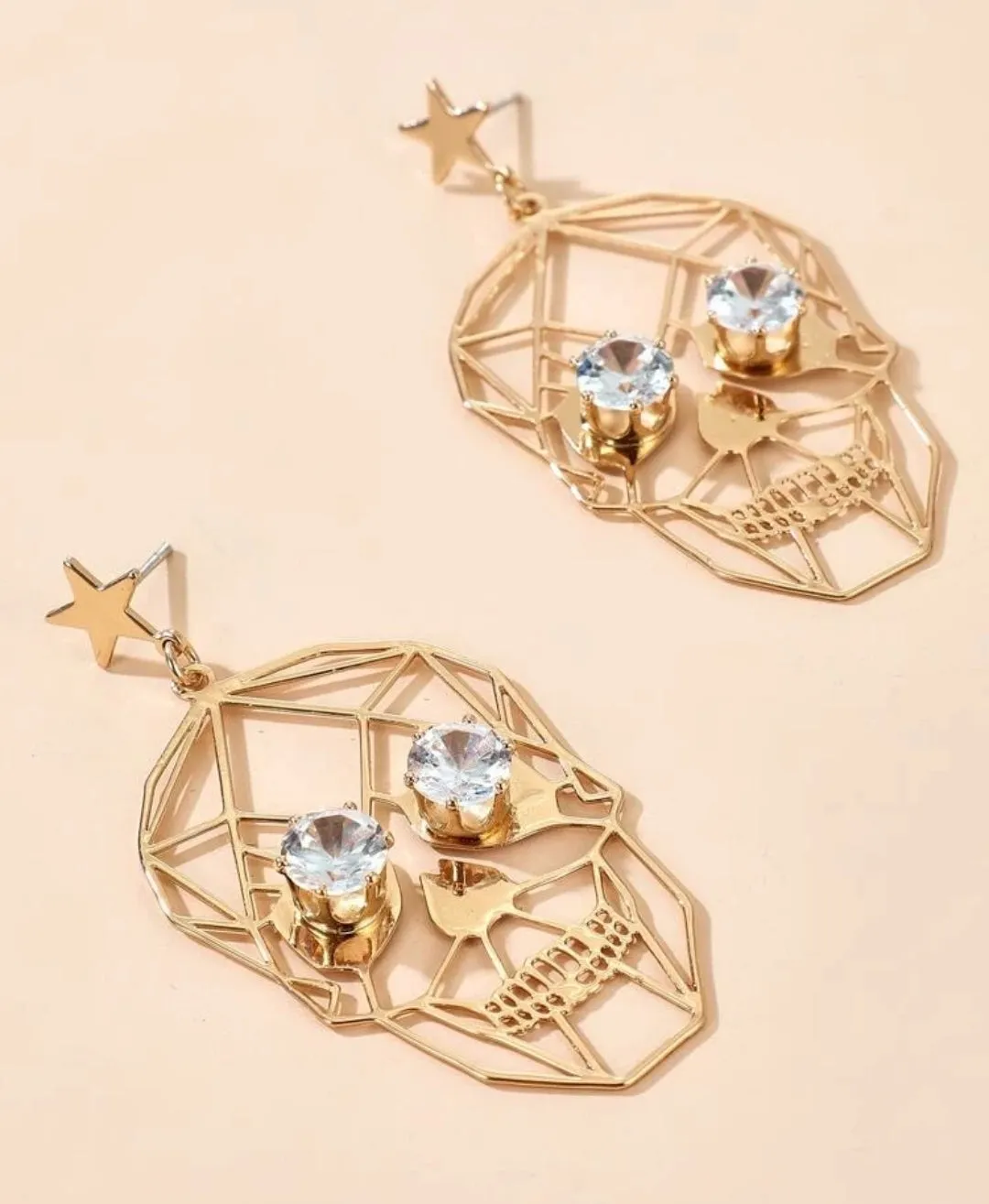 Hollow out skull earrings