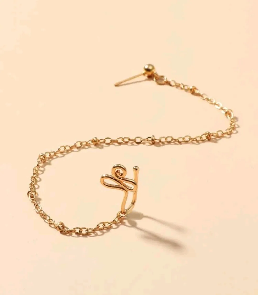 Structured Nose Ring With Chain To Ear.